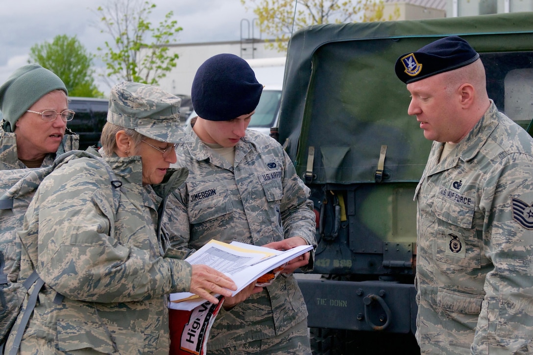Airmen assigned to the New York Air National Guard's 174th Attack Wing prepare to depart Hancock Field Air National Guard Base in Syracuse, N.Y., for an emergency response mission preparing sandbags to combat flooding at Sodus Point, N.Y., May 8, 2017. More than 120 New York Air and Army National Guardsmen are on state active duty in counties bordering Lake Ontario to help combat rising flood waters at the direction of New York Gov. Andrew M. Cuomo.  New York Air National Guard photo by Master Sgt. Lillque Ford