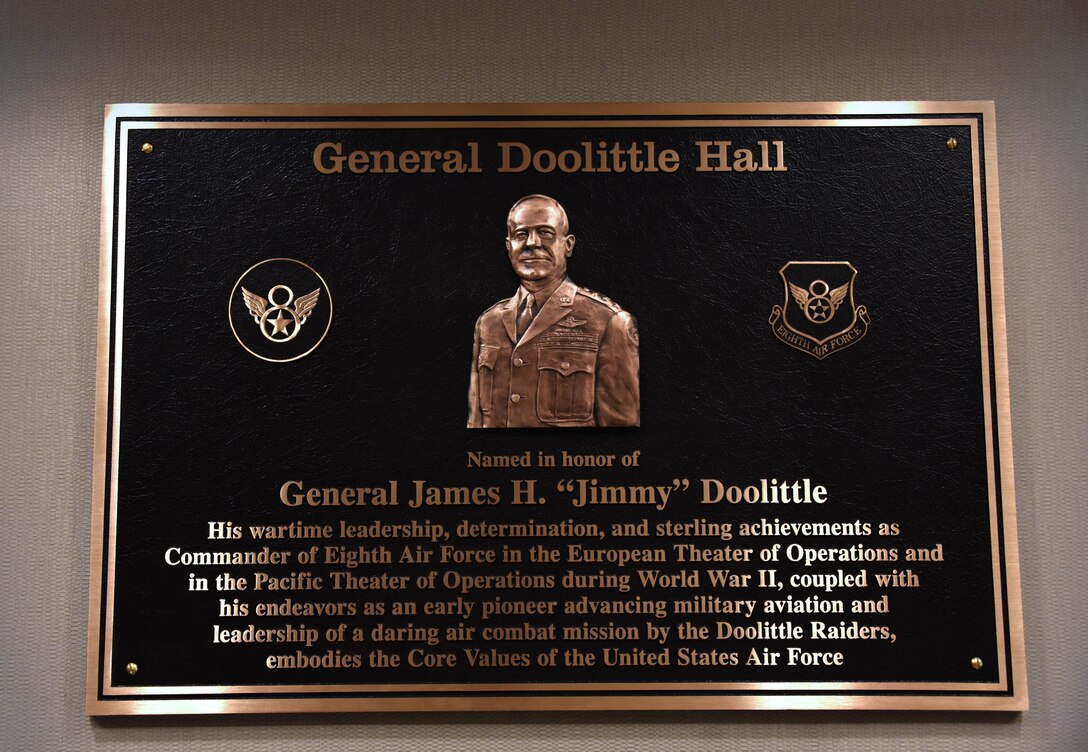 The General Doolittle Hall plaque is hung in the Headquarters Eighth Air Force building foyer on May 5, 2017. During a series of Eighth Air Force 75th anniversary events, the building was officially dedicated to Doolittle earlier in the year on Feb. 3. (U.S. Air Force photo by Senior Airman Erin Trower)