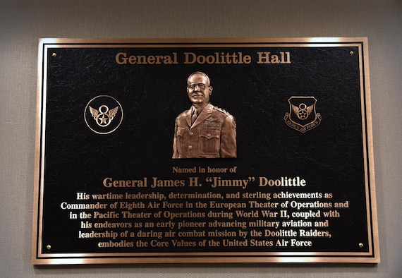 The General Doolittle Hall plaque is hung in the Headquarters Eighth Air Force building foyer on May 5, 2017. During a series of Eighth Air Force 75th anniversary events, the building was officially dedicated to Doolittle earlier in the year on Feb. 3. (U.S. Air Force photo by Senior Airman Erin Trower)