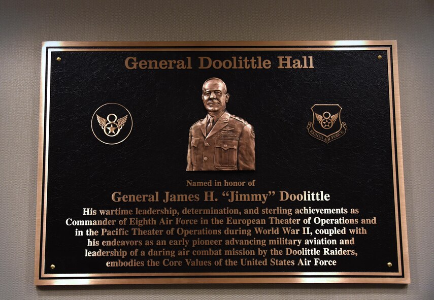 The General Doolittle Hall plaque is hung in the Headquarters Eighth Air Force building foyer on May 5, 2017. During a series of Eighth Air Force 75th anniversary events, the building was officially dedicated to Doolittle earlier in the year on Feb. 3. (U.S. Air Force photo by Senior Airman Erin Trower)