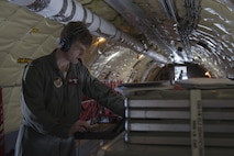 EIELSON AIR FORCE BASE, Alaska – U.S. Air Force Maj. Scott Karl, a 909th Air Refueling Squadron KC-135 instructor pilot assigned to Kadena Air Base, Japan, checks the status of a Roll-On Beyond-Line-of-Sight Enhancement system on a KC-135T Stratotanker from Fairchild Air Force Base, Wash., May 9, 2017, during NORTHERN EDGE 2017 (NE17), over the Joint Pacific-Alaska Range Complex. NE17 is Alaska’s premier joint training exercise designed to practice operations, techniques and procedures as well as enhance interoperability among the services. Thousands of participants from all the services, Airmen, Soldiers, Sailors, Marines and Coast Guardsmen from active duty, Reserve and National Guard units are involved. (U.S. Air Force photo/Staff Sgt. Ashley Nicole Taylor)