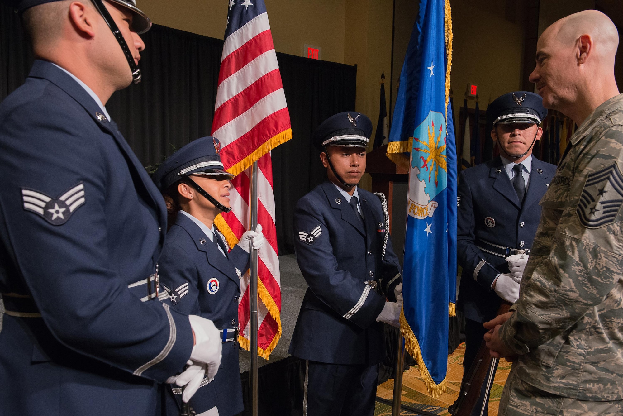 Airmen from the 137th Special Operations Wing Honor Guard visit with Chief Master Sgt. Ronald C. Anderson, command chief master sergeant of the Air National Guard, prior to presenting colors to open the 2017 Air National Guard Leadership Conference at the National Center for Employee Development Conference Center, Norman, Okla., May 8, 2017. The leadership conference, attended by general officers, adjutant generals, wing commanders, command chiefs and directors of staff from across the 54 U.S. states and territories, focused on leading, protecting and supporting the 21st-century Guard Airman. (U.S. Air National Guard photo by Senior Master Sgt. Andrew M. LaMoreaux)