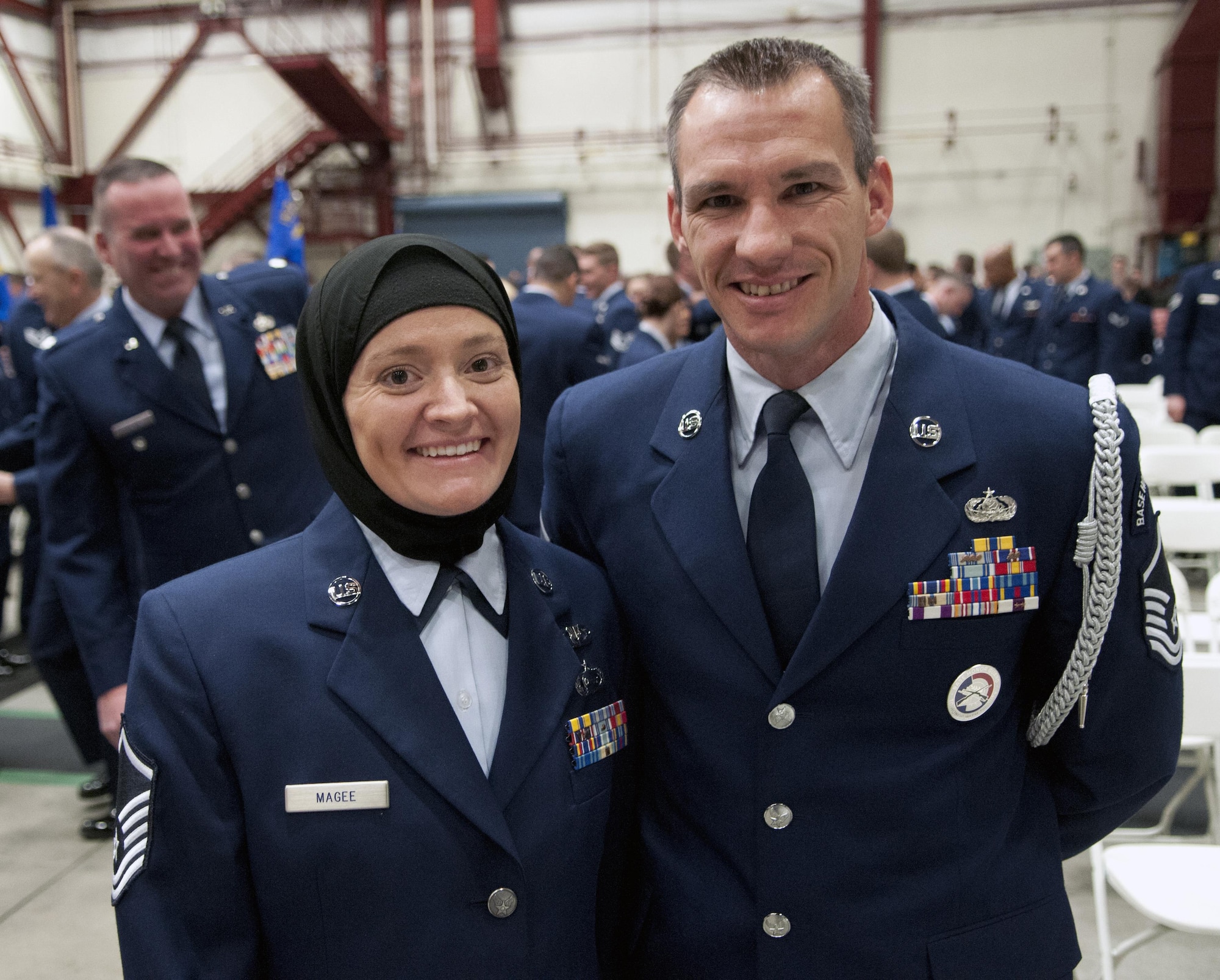 Master Sgts. Laura and Mark Magee attend the annual Nevada Air National Guard Airman of the Year Ceremony at the Nevada ANG’s fuel cell hangar Dec. 4, 2016. The married couple converted to Islam after Laura completed the chaplain assistant course in Fort Jackson, S.C. three years ago. (U.S. Air National Guard photo/Tech. Sgt. Emerson Marcus)