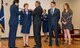 U.S. Air Force Col. Theresa Prince is pinned her star, by retired Brig. Gen. Jim Chow and her husband Ken, at McEntire Joint National Guard Base, Eastover, S.C., Nov. 7, 2015.  Prince has 37 years of military experience, 19 in the South Carolina Air National Guard and is the first female to be promoted as a general officer in the unit.   (U.S. Air National Guard photo by Tech. Sgt. Jorge Intriago/Released)