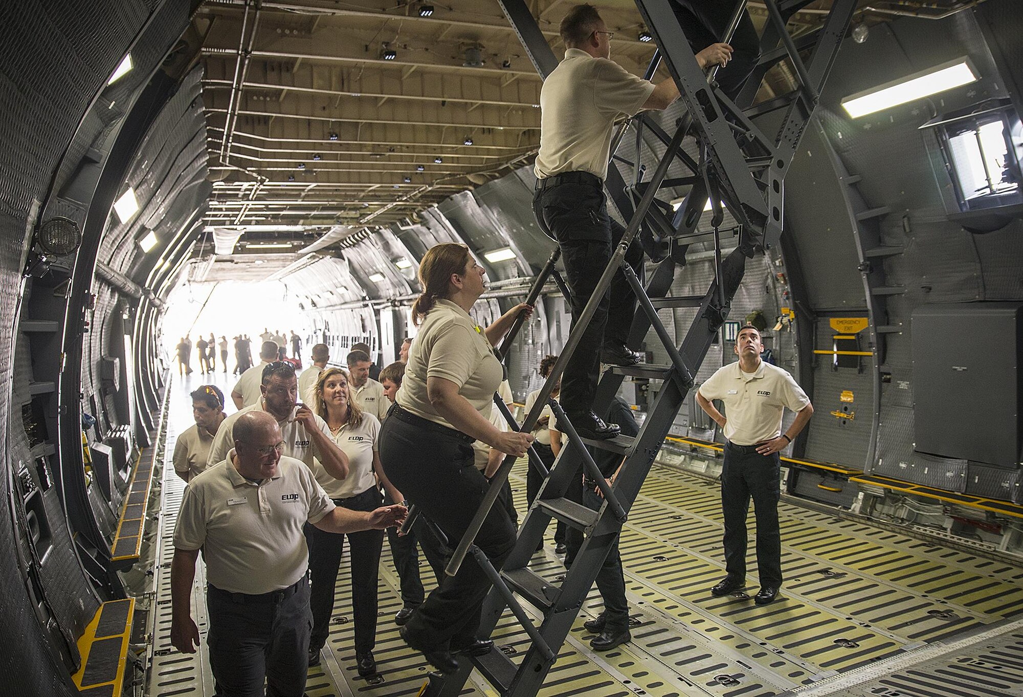 Members of the Department of Defense Executive Leadership Development Program tour the troop compartment of a C-5M Super Galaxy aircraft May 10, 2017 at Joint Base San Antonio-Lackland, Texas. (U.S. Air Force photo by Benjamin Faske)