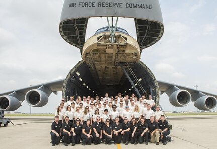 Members of the Department of Defense Executive Leadership Development Program take a group photo on the ramp of a C-5M Super Galaxy aircraft May 10, 2017 at Joint Base San Antonio-Lackland, Texas.  (U.S. Air Force photo by Benjamin Faske)