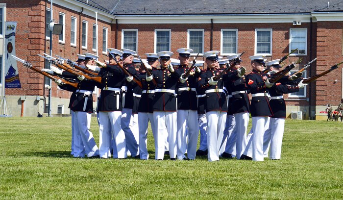 The Silent Drill Platoon from Marine Barracks Washington, D.C. 8th & I, performed at the Quantico Centennial Celebration May 10.  The Platoon makes hundreds of appearances each year in the U.S. and abroad.  The platoon consists of infantry Marines and all precise movements are conducted with no voice commands.