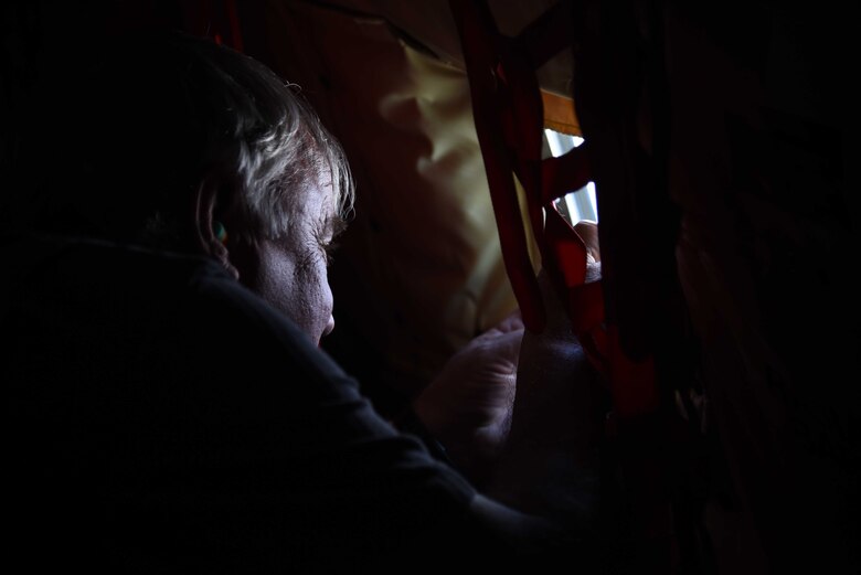 John Betzen, a local landowner, takes a photo through the window of a KC-135 Stratotanker assigned to McConnell Air Force Base, Kan. May 10, 2017, while flying over Colorado. A Landowner Appreciation Flight is held annually to show local landowners who are part of the Bird/Wildlife Aircraft Strike Hazard program the importance of the tanker mission. (U.S. Air Force photo/Airman 1st Class Erin McClellan)