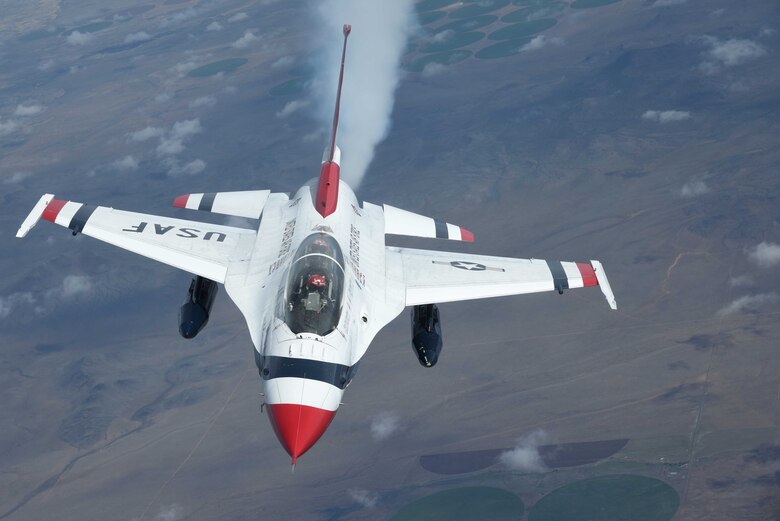 An F-16 Fighting Falcon assigned to Nellis Air Force Base, Nev., flies over Colorado May 10, 2017. A KC-135 Stratotanker assigned to McConnell Air Force Base, Kan., refueled the F-16, which is one of the U.S. Air Force Thunderbirds. (U.S. Air Force photo/Airman 1st Class Erin McClellan)