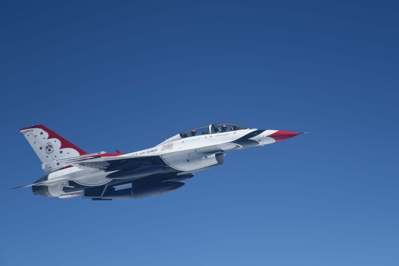 An F-16 Fighting Falcon assigned to Nellis Air Force Base, Nev., flies near a KC-135 Stratotanker assigned to McConnell Air Force Base, Kan., May 10, 2017. The F-16 was supported by the KC-135 during its journey to Pittsburgh, Pa., including through thunderstorms when visibility was low. (U.S. Air Force photo/Airman 1st Class Erin McClellan)
