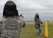 Airmen 1st Class Christopher Benson and Brenton White, response force members assigned to the 28th Security Force Squadron, draw their weapons during a “quick draw” event at Ellsworth Air Force Base, S.D., May 9, 2017. The event involved an adversary sprinting towards SFS personnel while they reloaded with only their dominant hand. (U.S. Air Force photo by Airman Nicolas Z. Erwin)