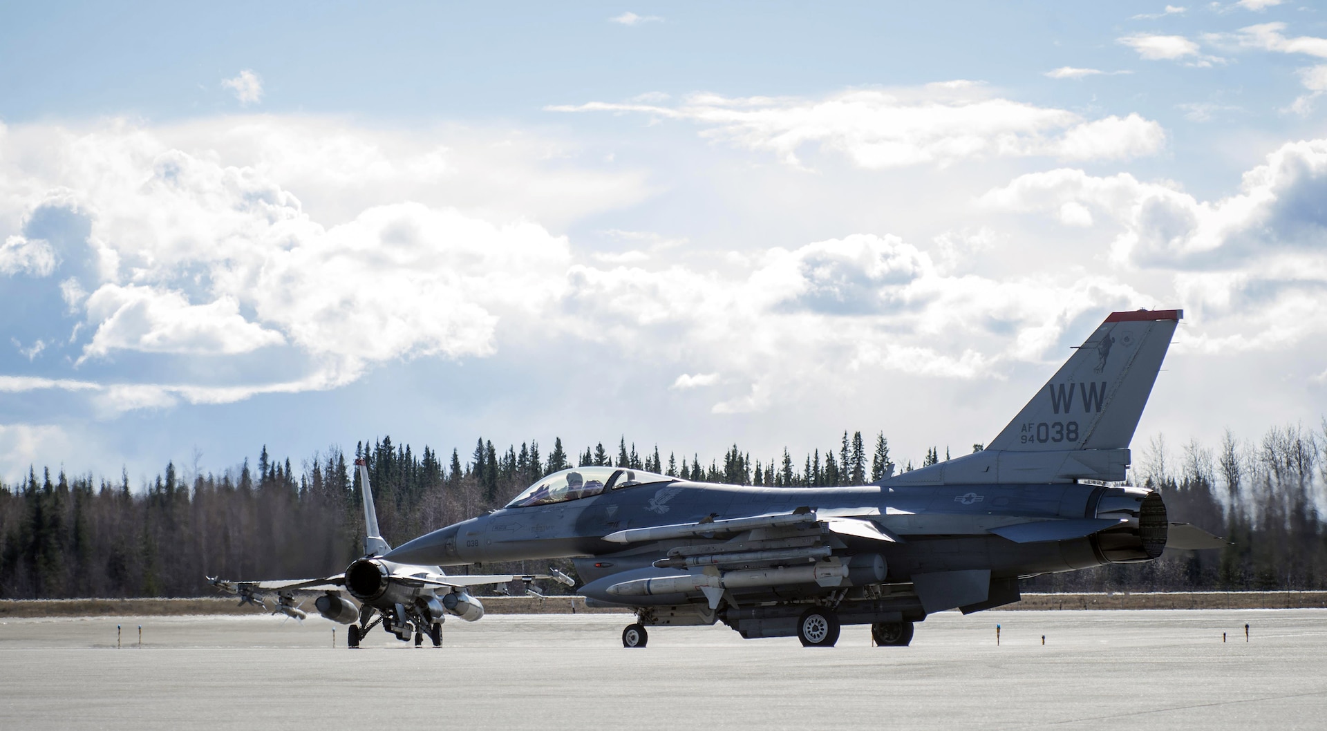 Two F-16 Fighting Falcons with the 13th Fighter Squadron from Misawa Air Base, Japan, taxi to the runway during Northern Edge 2017 (NE17) at Eielson Air Force Base, May 26, 2017. NE17 provides aircrews an opportunity to hone current and test future applications of combat operations and weapons capabilities. 