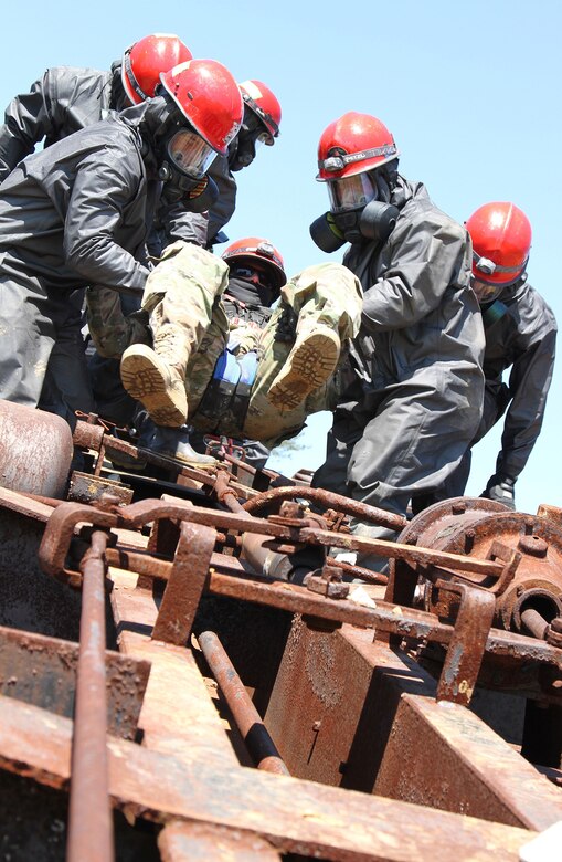 U.S. Army Reserve firefighters with the 468th Engineer Detachment, Danvers, Massachusetts, carry a casualty from the wreckage of a train derailment exercise, part of Guardian Response 17 at Muscatatuck Urban Training Center, Butlerville, Indiana, May 7, 2017.
Nearly 4,100 Soldiers from across the country are participating in Guardian Response 17, a multi-component training exercise to validate U.S. Army units’ ability to support the Defense Support of Civil Authorities (DSCA) in the event of a Chemical, Biological, Radiological, and Nuclear (CBRN) catastrophe.