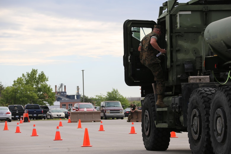 Pfc. Logan Harpine enters the cab of a M970 semitrailer refueler truck during a Semitrailer Refueler Operator Course at Marine Corps Air Station Cherry Point, N.C., May 9, 2017. Upon completion of the course, motor transport Marines gain the secondary military occupational specialty of semitrailer refueler operator. Harpine is a motor transport operator with 2nd Transport Battalion, Combat Logistics Regiment 2, 2nd Marine Logistics Group (U.S. Marine Corps photo by Cpl. Jason Jimenez/ Released)