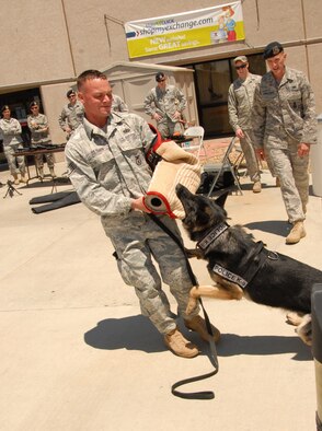 May 15: Police Week Opening Ceremony begins at 7:15 a.m. at the Airman Leadership School Drill Pad. Beginning at 10 a.m. there will be a Combat Arms Training and Maintenance display and K-9 demonstration at the Base Exchange. (U.S. Air Force photo by Kenji Thuloweit)