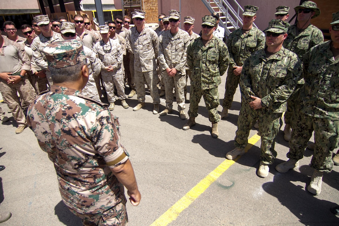 Jordanian Brig. Gen. Khalid al-Shara addresses a group of U.S. Marines and Coast Guard during an multi-national exercise in Aqaba Jordan.  Eager Lion is an annual U.S. Central Command exercise in Jordan designed to strengthen military-to-military relationships between the U.S., Jordan and other international partners. This year's iteration is comprised of about 7,200 military personnel from more than 20 nations that will respond to scenarios involving border security, command and control, cyber defense and battlespace management.  (U.S. Army photo by Sgt. Mickey A. Miller)