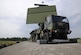 A AN/TPS-75 radar rests on the back of a transport vehicle at the Alpena Combat Readiness Training Center, Mich., July 29, 2015. The AN/TPS-75 radar is capable of providing coverage of more than 200 nautical miles in every direction and detecting aircraft as high as 95,000 ft. Following release of a contract award May 11, 2017, the radar, dating to the Vietnam War era and containing vacuum tube technology, will be replaced by Raytheon Co. built three dimensional expeditionary long-range radars by 2028.  (U.S. Air National Guard photo by Senior Airman Ryan Zeski/Released)