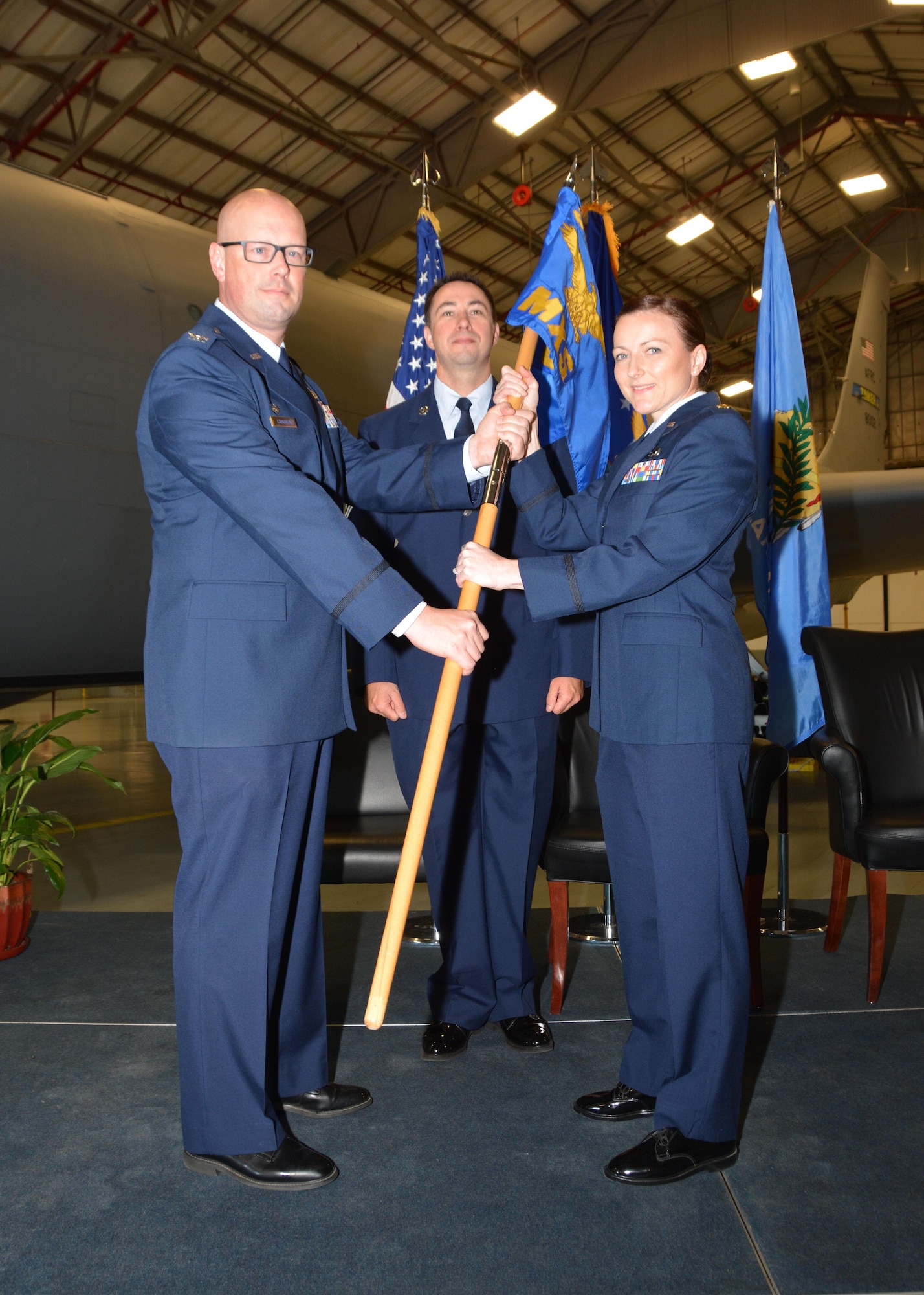 Maj. Melissa Jones, 507th Maintenance Squadron commander, takes the guidon from Col. Travis Caughlin, 507th Maintenance Group commander May 6, 2017, during the 507th Maintenance Squadron change of command ceremony at Tinker Air Force Base, Okla. (U.S. Air Force photo/Tech. Sgt. Lauren Gleason)