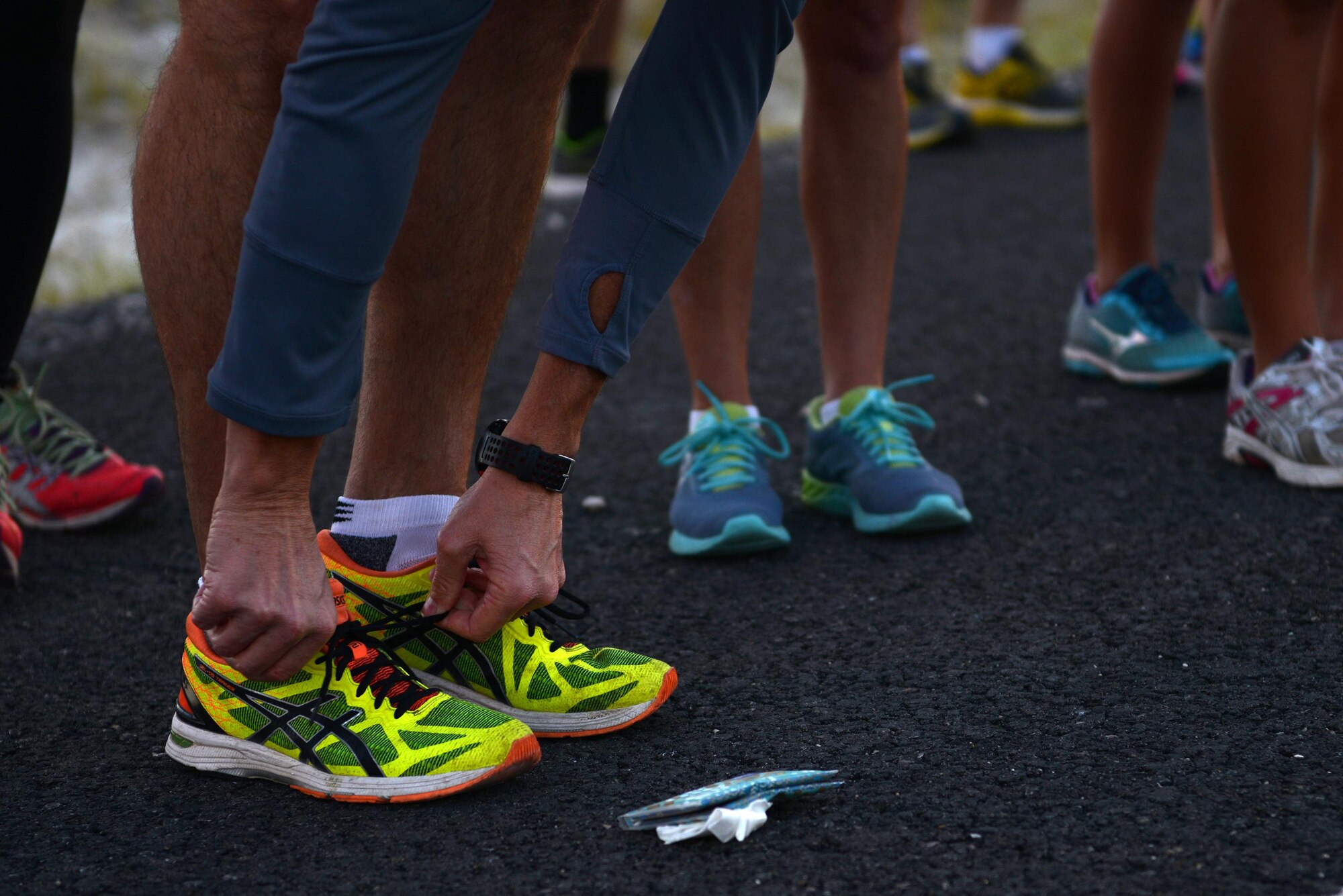 A contestant ties his shoes in preparation for the 2017 Adventure Race in Del Rio, Texas, May 6, 2017. The first three-mile leg of the event was a run from Laughlin Air Force Base’s West Gate, to the first hand-off station, where the teams transitioned for the 20-mile bike ride. (U.S. Air Force photo/ Airman 1st Class Benjamin N. Valmoja)