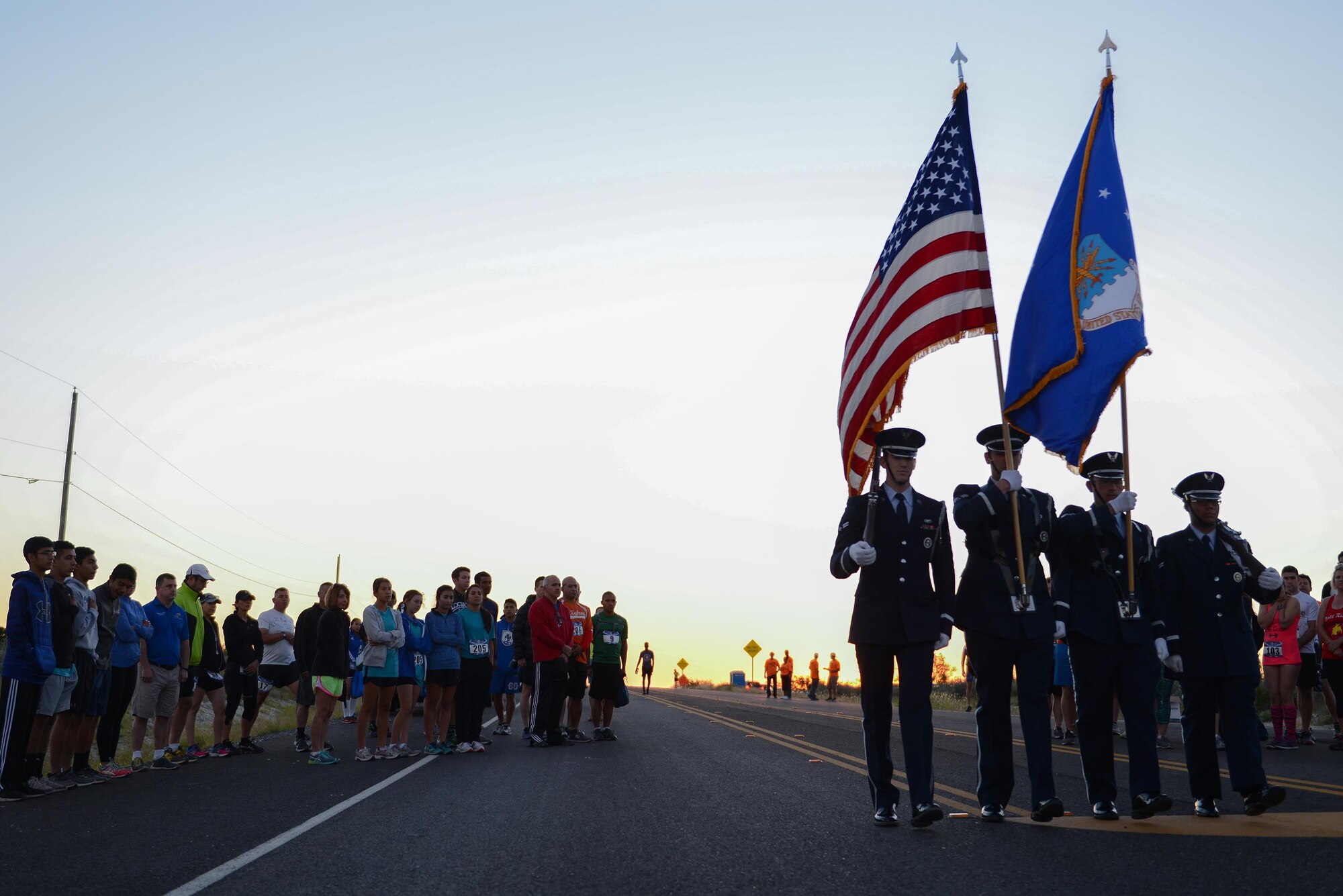 Laughlin’s Honor Guard marches away after presenting the colors in Del Rio, Texas, May 6, 2017. The honor guard presented the colors before the start of the 2017 Adventure Race, which included a three-mile run from the west gate of Laughlin Air Force Base, a 20-mile bike ride to Lake Amistad and a one-mile row. (U.S. Air Force photo/Airman 1st Class Benjamin N. Valmoja)