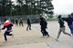 Participants run away from a simulated explosion during a Major Accident Response Exercise, May 10, 2017, at Seymour Johnson Air Force Base, North Carolina. By working together during the scenario, members of the 4th Fighter Wing and Wayne County Emergency Services trained to enhance response capabilities in the event of a real-world crisis. (U.S. Air Force photo by Airman 1st Class Kenneth Boyton)
