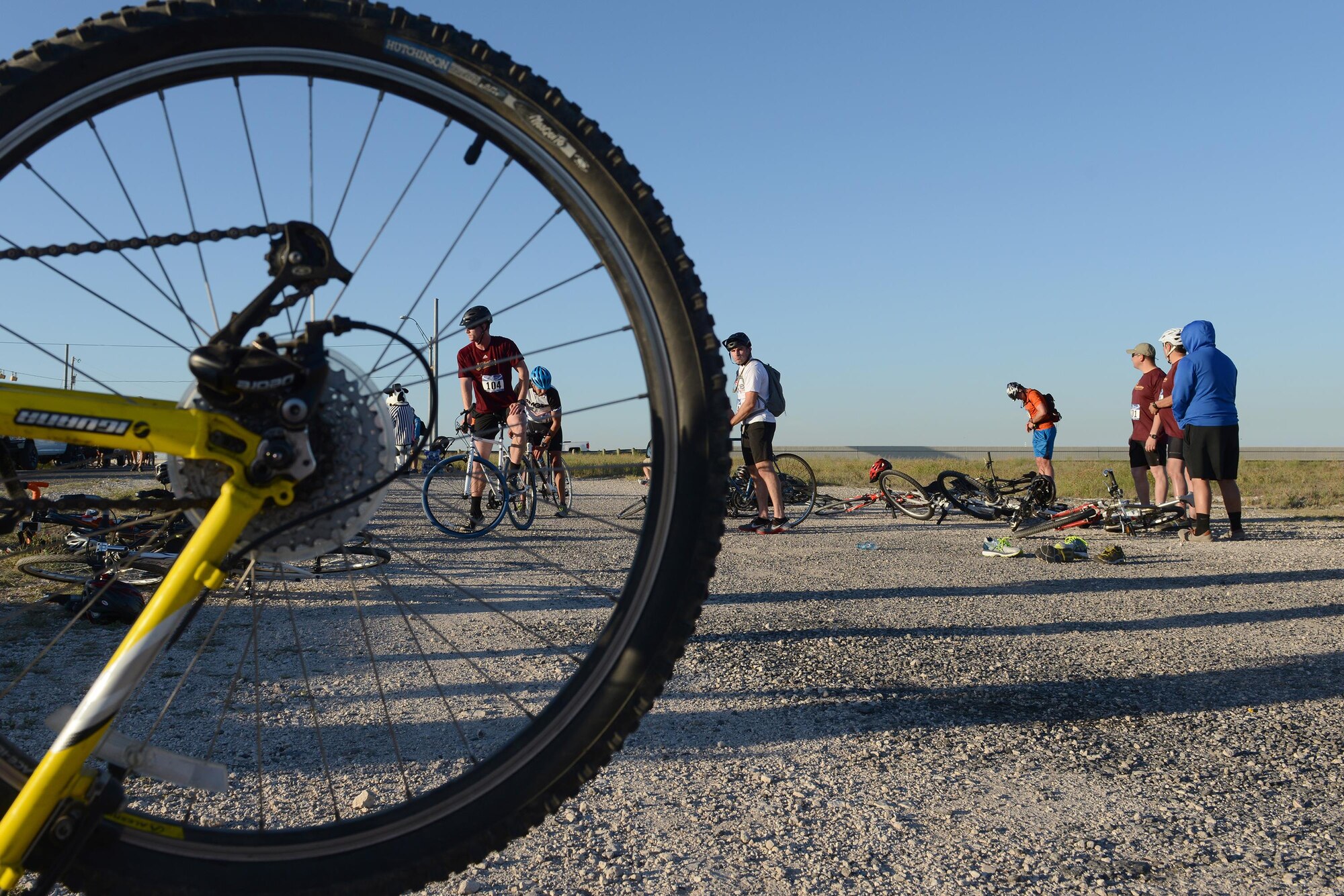 A contestant mounts his bike during the 2017 Adventure Race, in Del Rio, Texas, May 6, 2017. All competetors had to complete the biking section of the event – a 20-mile ride to Lake Amistad. (U.S. Air Force photo/Airman 1st Class Benjamin N. Valmoja)
