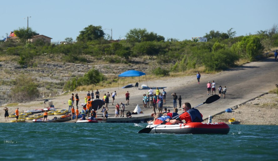 A pair of participants in the 2017 Adventure Race row toward the finish line at the Laughlin Southwinds Marina, in Del Rio, Texas, May 6, 2017. Those participating in the event rowed the last one-mile leg of the race, getting them one step closer to finishing. (U.S. Air Force photo/Airman 1st Class Benjamin N.
Valmoja)