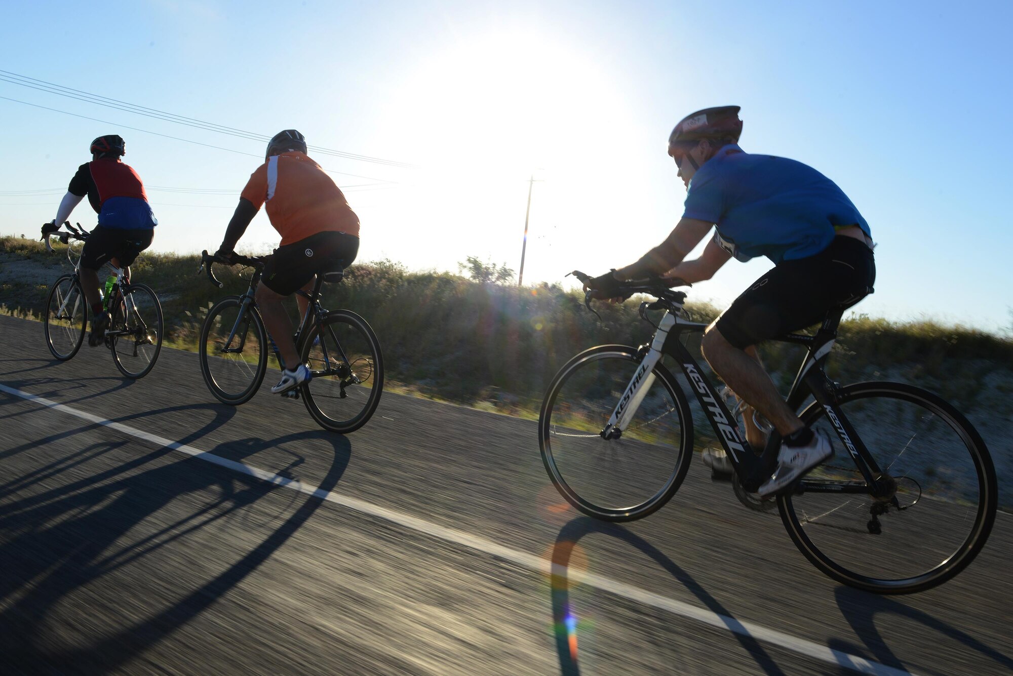 Contestants in the 2017 Adventure Race pedal toward the finish line in Del Rio, Texas, May 6, 2017. The Adventure Race challenged participants, putting them through a three-mile run from the west gate of Laughlin Air Force Base, a 20 mile bike ride and a one-mile row. (U.S. Air Force photo/Airman 1st Class Benjamin N. Valmoja)