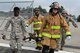 Sheila Davis, 4th Medical Group health/disease management/health care integrator (right), applies moulage to Staff Sgt. Ethan Thompson, 4th Aircraft Maintenance Squadron crew chief, who acted as a simulated victim during a Major Accident Response Exercise, May 10, 2017, at Seymour Johnson Air Force Base, North Carolina. During the exercise, members of the 4th MDG and Wayne County Emergency Medical Services exercised triage and crisis response efforts. (U.S. Air Force photo by Airman Shawna Keyes)