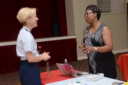 Brig. Gen. Heather Pringle, 502nd Air Base Wing and Joint Base San Antonio commander, speaks with Donna Hollie, Defense Language Institute English Language Center filed studies specialist, during the JBSA-Lackland Military Spouse Appreciation Event May 4, 2017, at Arnold Hall Community Center.  The JBSA-Lackland Military & Family Readiness Center hosted the event to celebrate military spouses and provide an opportunity for them to showcase their personal businesses to the community. (U.S. Air Force photo by Staff Sgt. Marissa Garner)