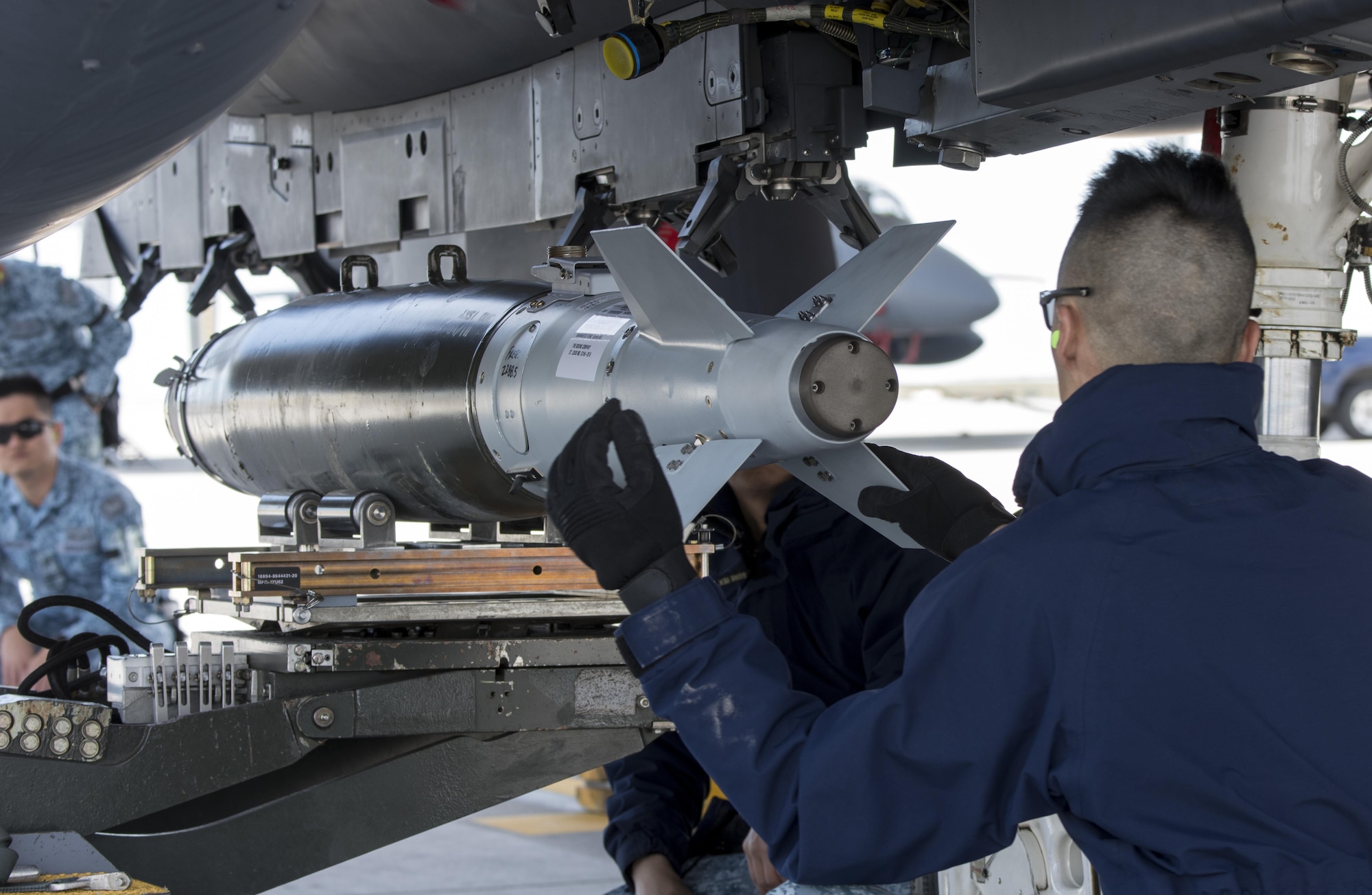 Members of the Republic of Singapore Air Force prepare an F-15SG for Combat Hammer May 1, 2017, at Mountain Home Air Force Base, Idaho. The exercise was a testament to the great working relationship between the RSAF and the United States Air Force. (U.S. Air Force photo by Senior Airman Jeremy L. Mosier/Released)