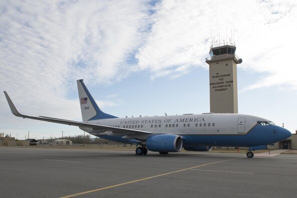 A Boeing 737 aircraft sits in front of an air traffic control tower, May 11, 2017, at Eielson Air Force Base, Alaska. The U.S. Secretary of State Rex Tillerson landed at Eielson on his way to the 10th Annual Arctic Council Ministerial, the leading intergovernmental forum promoting cooperation, coordination and interaction among the Arctic States, Arctic indigenous communities and other Arctic inhabitants on common Arctic issues. (U.S. Air Force photo by Airman Eric M. Fisher)