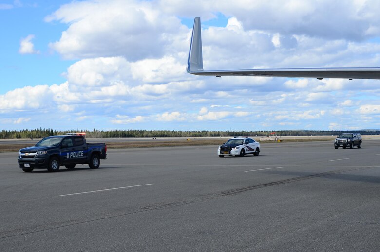 A 354th Security Forces Squadron vehicle leads the U.S. Secretary of State Rex Tillerson’s motorcade May 11, 2017 at Eielson Air Force Base, Alaska. Tillerson landed at Eielson on his way to the 10th Annual Arctic Council Ministerial, the leading intergovernmental forum promoting cooperation, coordination and interaction among the Arctic States, Arctic indigenous communities and other Arctic inhabitants on common Arctic issues. (U.S. Air Force photo by Airman Eric M. Fisher)