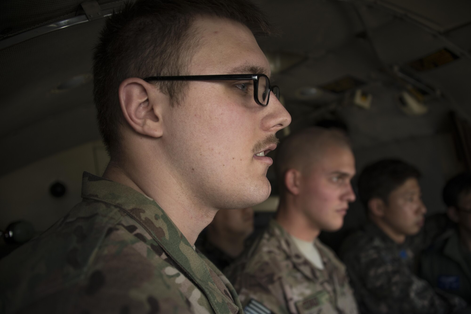 A U.S. Air Force 353rd Special Operations Support Squadron fixed communications officer-in-charge and radio frequency technician learn about the radio capabilities utilized by the Republic of Korea 255th Special Operations Squadron during a communication exchange on a ROK Air Force C-130, March 29, 2017 at Daegu Air Base, ROK. Foal Eagle 2017 provided the opportunity for targeted tactical exchanges focused on further developing interoperability with counterparts from the ROK military. (U.S. Air Force photo by Capt. Jessica Tait)