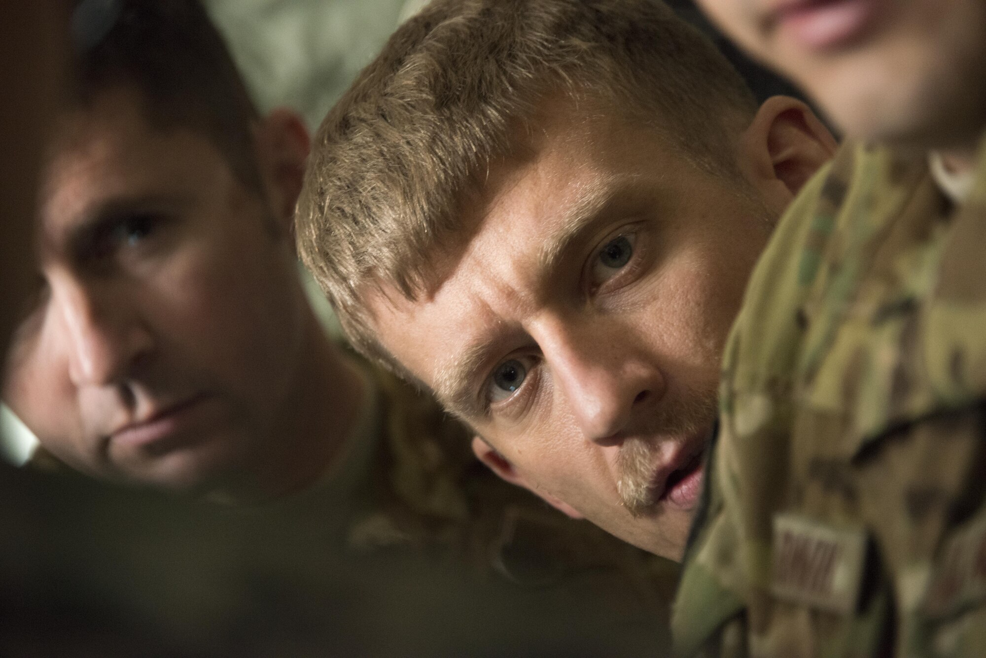 A U.S. Air Force 17th Special Operations Squadron pilot listens to the Republic of Korea Special Warfare Command jumpmaster prior to combined airborne operations, March 27, 2017 at Daegu Air Base, ROK. Foal Eagle 2017 provided the opportunity at further developing interoperability with counterparts from the ROK military through daily airborne operations to include military free fall and static line drops. (U.S. Air Force photo by Capt. Jessica Tait)