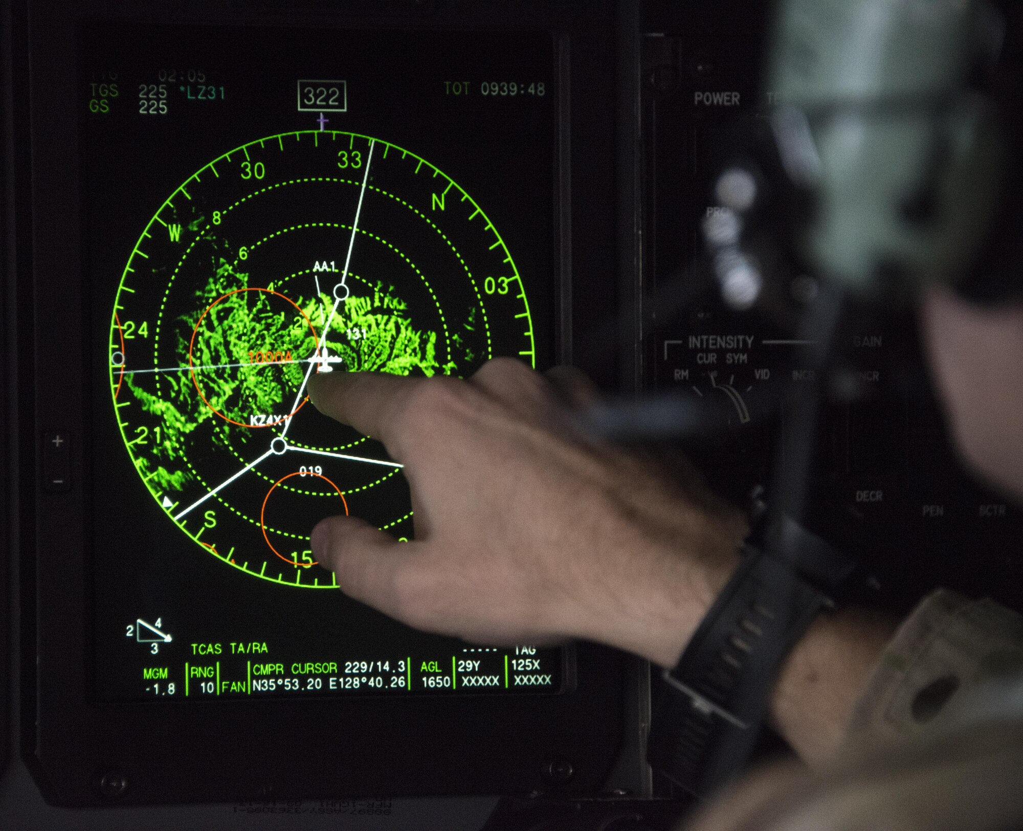 A U.S. Air Force 17th Special Operations Squadron combat systems operator monitors the radar display during low-level operations through mountainous terrain on the Republic of Korea peninsula, April 1, 2017. Experts in specialized aviation, the 1st SOS and 17th SOS accomplished critical training objectives and executed complex missions with joint and combined partners during Foal Eagle 2017. (U.S. Air Force photo by Capt. Jessica Tait)