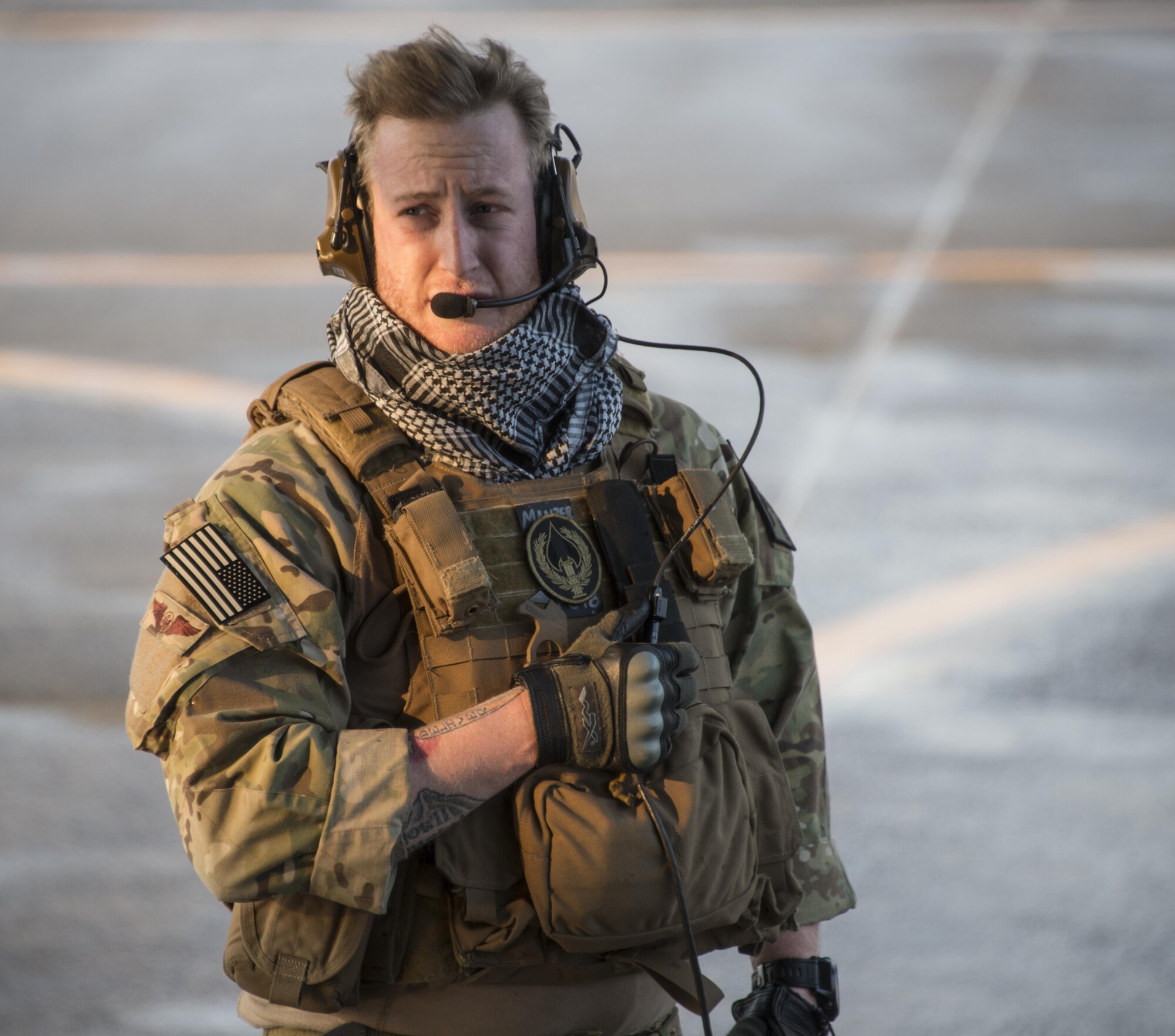 A U.S. Air Force 17th Special Operations Squadron loadmaster maintains communication with aircrew during a forward area refueling point (FARP) operation, April 1, 2017 at Daegu Air Base, Republic of Korea. The FARP operations performed during Foal Eagle 2017 demonstrate the covert and nighttime refueling options available in situations where traditional refueling capabilities are not feasible. (U.S. Air Force photo by Capt. Jessica Tait)