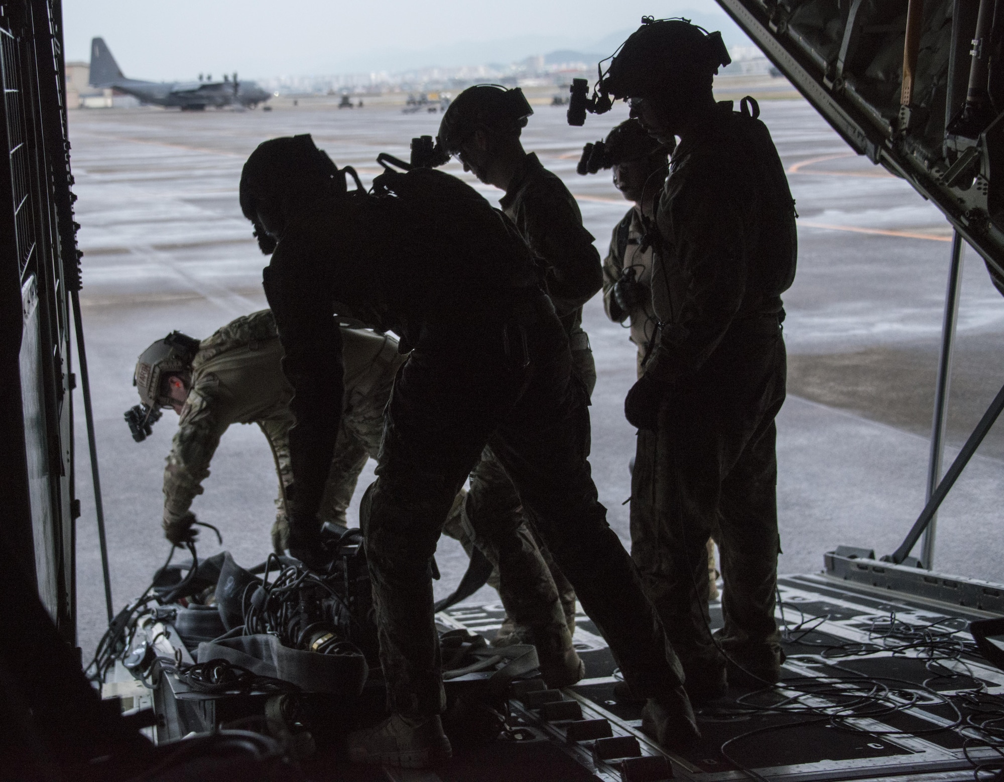 U.S. Air Force 18th Logistic Readiness Squadron forward area refueling point (FARP) technicians execute FARP operations from a U.S. Air Force MC-130J Commando II assigned to the 17th Special Operations Squadron, April 1, 2017 at Daegu Air Base, Republic of Korea. The FARP operations performed during Foal Eagle 2017 demonstrate the covert and nighttime refueling options available in situations where traditional refueling capabilities are not feasible. (U.S. Air Force photo by Capt. Jessica Tait)