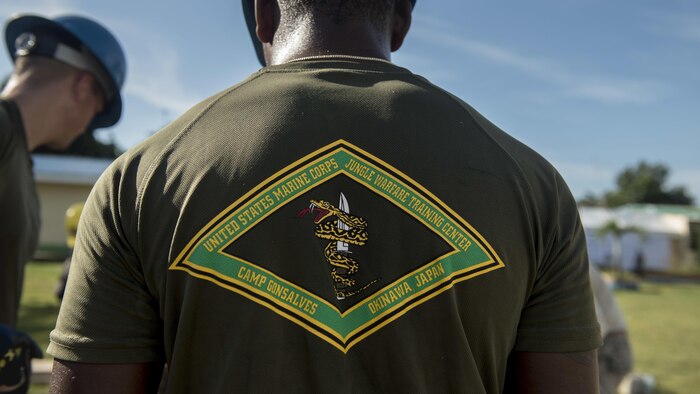 U.S. Marines with 9th Engineer Support Battalion, 3rd Marine Logistics Group, load barrels with materials during Balikatan 2017 in Ormoc City, Leyte, April 27, 2017. U.S. military engineers worked together with Philippine Soldiers to build new classrooms at Margen Elementary School in Ormoc City. Balikatan is an annual U.S.-Philippine bilateral military exercise focused on a variety of missions, including humanitarian assistance and disaster relief, counterterrorism, and other combined military operations. (U.S. Air Force photo by Staff Sgt. Peter Reft)