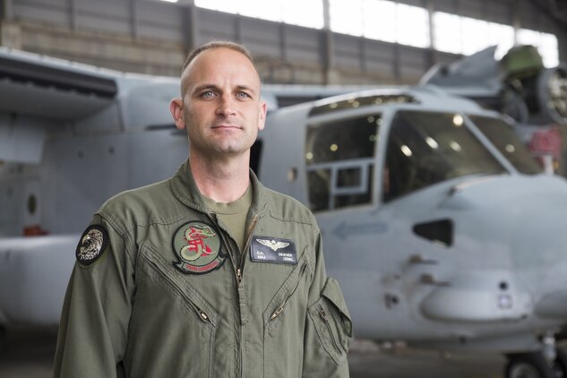 Maj. Christopher A. Denver was honored as the 1st Marine Aircraft Wing Aviator of the Year Award recipient last month at Marine Corps Air Station Futenma, Okinawa, Japan. The Alfred A. Cunningham Award (Marine Aviator of the Year) first recognizes the top aviator in each MAW, and then identifies an overall winner from those finalists. The Marine Corps Aviation Association announced Capt. Hugh E. Anderson, assigned to Marine All Weather Fighter Attack Squadron 533, Marine Aircraft Group 31, 2nd MAW, as the winner of the Marine Corps wide Aviator of the Year. Denver, from San Antonio, Texas, is the executive officer of Marine Medium Tiltrotor Squadron 265, MAG 36, 1st MAW. (U.S. Marine Corps photo by Lance Cpl. Bernadette Wildes) 