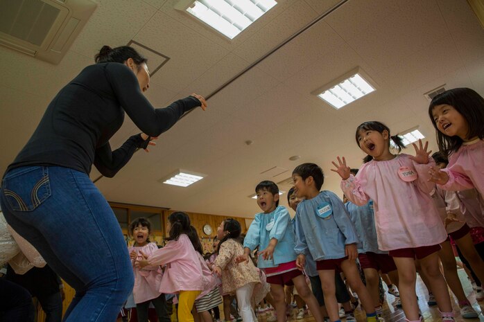 U.S. Marine Corps Cpl. Da Hee Park, a volunteer with the Marine Memorial Chapel, pretends to be a tiger with Josho Hoikuen Preschool students during a community relations event in Iwakuni City, Japan, May 9, 2017. Volunteering at the preschool helped the relationship between Marine Corps Air Station Iwakuni residents and the local community grow stronger. Introductions were given by the volunteers while students asked them questions, then the children were introduced to “The Hokey Pokey” and “Head, Shoulders, Knees and Toes” before playing educational games with the volunteers. (U.S. Marine Corps photo by Lance Cpl. Gabriela Garcia-Herrera)