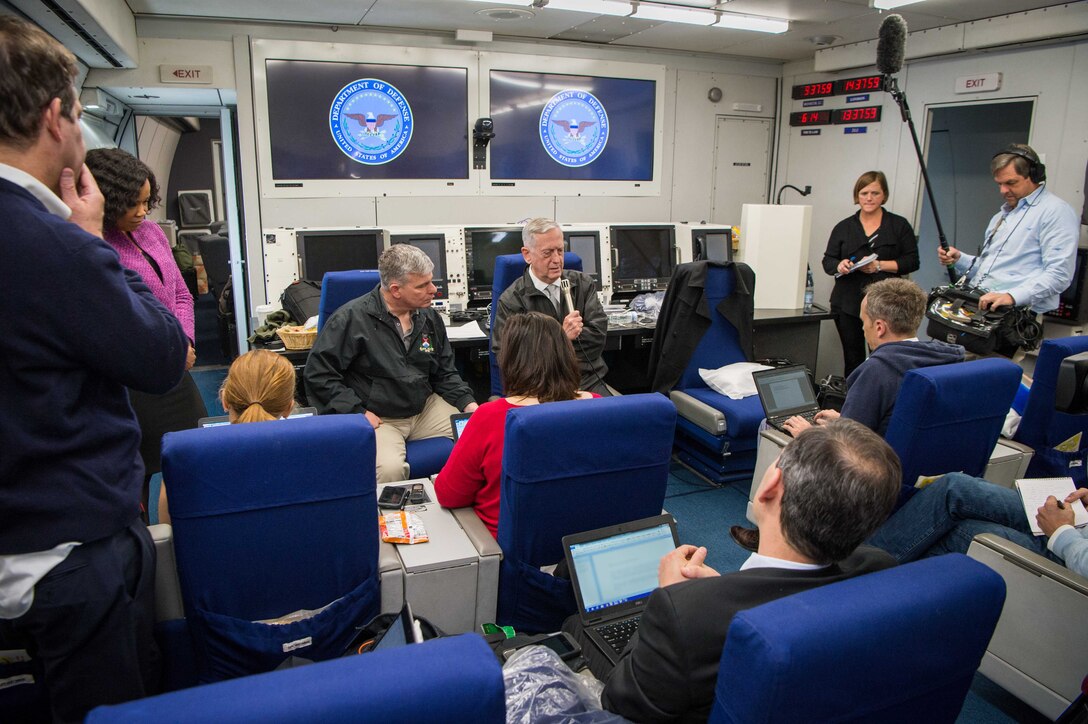 Defense Secretary Jim Mattis briefs reporters aboard his aircraft on its flight back to Washington, D.C., following the secretary’s participation in a conference on Somalia in London, May 11, 2017. DoD photo by Air Force Staff Sgt. Jette Carr