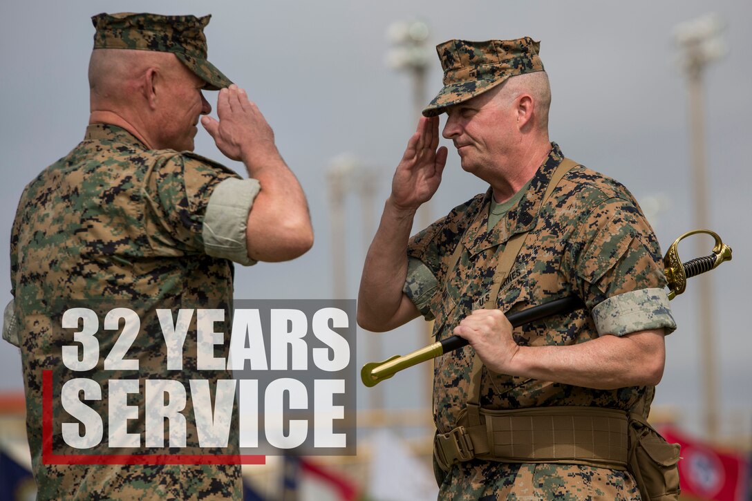 Sgt. Maj. Lee D. Bonar hands off the sword of office to III Marine Expeditionary Force Commanding General, Lt. Gen. Larry D. Nicholson during the III MEF sergeant major relief, appointment, and retirement ceremony at Camp Hansen, Okinawa, Japan on May 12, 2017. The ceremony took place to relieve Sgt. Maj. Lee D. Bonar Jr. of his duties as the III MEF sergeant major and to appoint Sgt. Maj. Mario A. Marquez in his place. Bonar, who enlisted out of Wheeling, West Virginia, retired after serving 32 years of honorable and faithful service. 