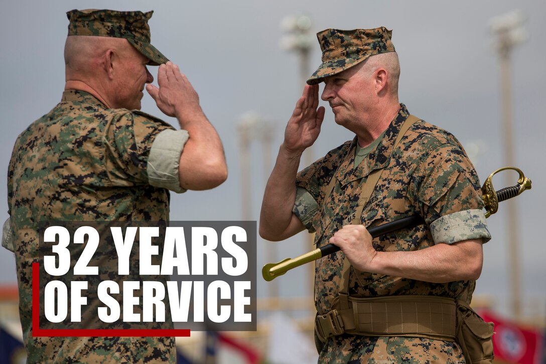 Sgt. Maj. Lee D. Bonar hands off the sword of office to III Marine Expeditionary Force Commanding General, Lt. Gen. Larry D. Nicholson during the III MEF sergeant major relief, appointment, and retirement ceremony at Camp Hansen, Okinawa, Japan on May 12, 2017. The ceremony took place to relieve Sgt. Maj. Lee D. Bonar Jr. of his duties as the III MEF sergeant major and to appoint Sgt. Maj. Mario A. Marquez in his place. Bonar, who enlisted out of Wheeling, West Virginia, retired after serving 32 years of honorable and faithful service. 