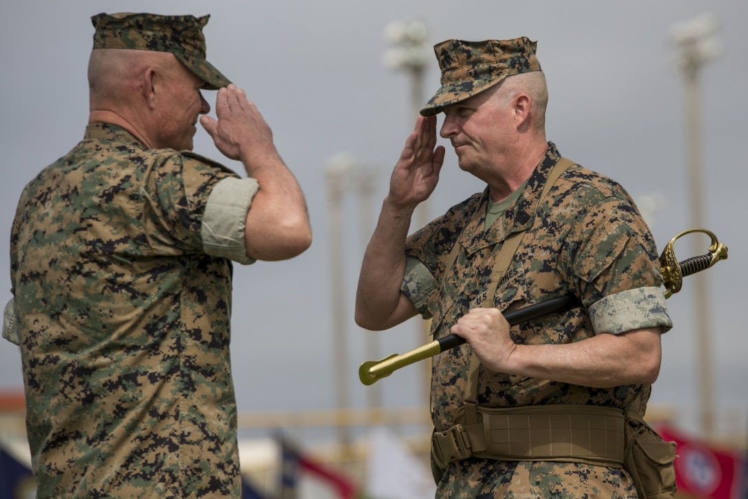 Sgt. Maj. Lee D. Bonar hands off the sword of office to III Marine Expeditionary Force Commanding General, Lt. Gen. Larry D. Nicholson during the III MEF sergeant major relief, appointment, and retirement ceremony at Camp Hansen, Okinawa, Japan on May 12, 2017. The ceremony took place to relieve Sgt. Maj. Lee D. Bonar Jr. of his duties as the III MEF sergeant major and to appoint Sgt. Maj. Mario A. Marquez in his place. Bonar, who enlisted out of Wheeling, West Virginia, retired after serving 32 years of honorable and faithful service. 

