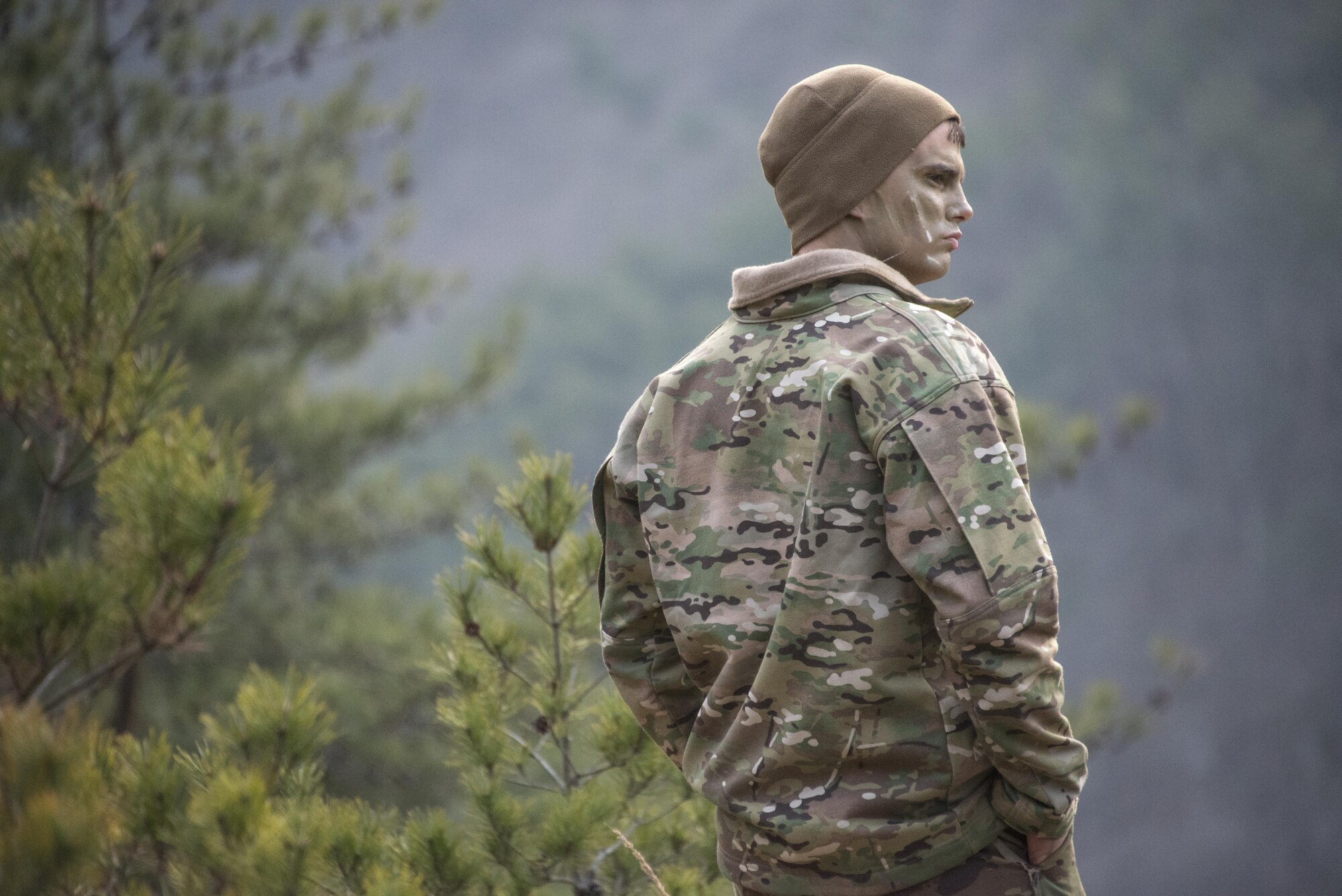 A U.S. Air Force 1st Special Operations Squadron pilot performs survival, evasion, resistance and escape (SERE) training following a simulated aircraft crash landing, March 30, 2017. Aircrew from the 1st SOS and 17th SOS received a refresher training on SERE procedures during exercise Foal Eagle’s personnel recovery event. (U.S. Air Force photo by Capt. Jessica Tait)