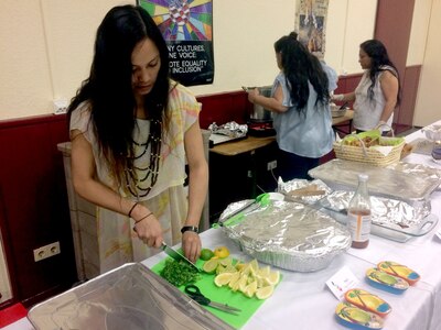 Attendees prepare food for guests of the 7th Mission Support Command and U.S. Army Garrison Rheinland-Pfalz, which celebrated Asian American Pacific Islander Heritage Month Thursday with dancing, food and fellowship. The event, which took place on Daenner Kaserne at the Kaiserslautern Community Activities Center, featured a number of musical and dance acts, as well as a variety of different foods from around the Pacific. 