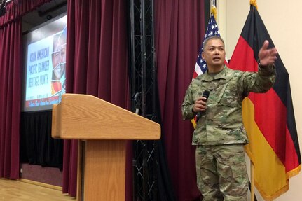 Col. Alex Wells, 7th Mission Support Command deputy commanding officer, speaks to guests of the 7th MSC and U.S. Army Garrison Rheinland-Pfalz, which celebrated Asian American Pacific Islander Heritage Month Thursday with dancing, food and fellowship. The event, which took place on Daenner Kaserne at the Kaiserslautern Community Activities Center, featured a number of musical and dance acts, as well as a variety of different foods from around the Pacific. 