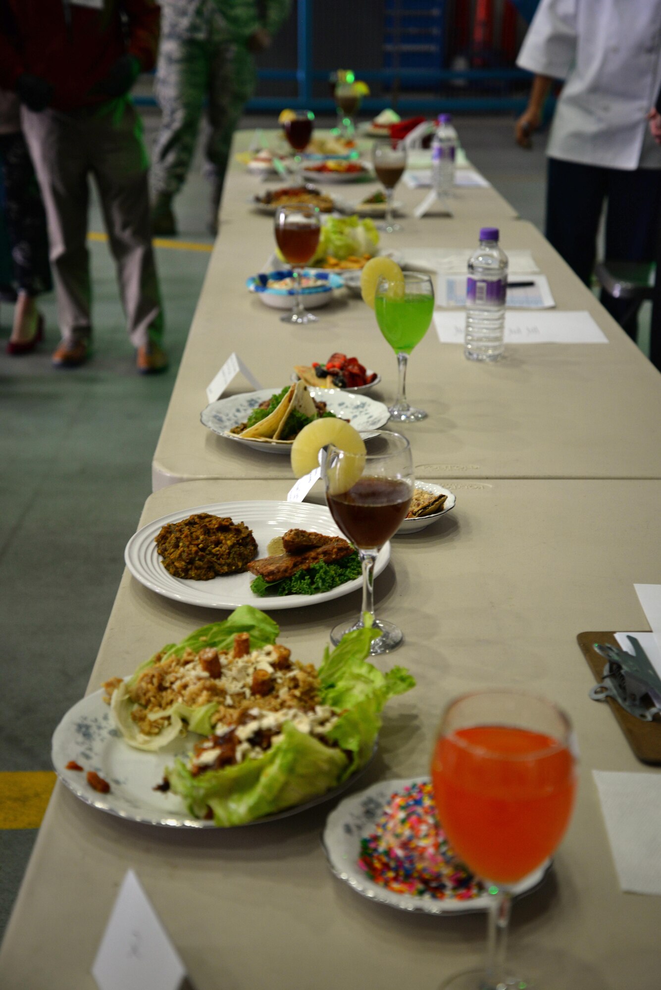 Gourmet style dishes from the Meal Ready to Eat Bake-Off competition sit on display May 9, 2017, on RAF Mildenhall, England. Base leadership and honorary commander teams create main dishes, side dishes, desserts and drinks with two MREs. (U.S. Air Force photo by Senior Airman Christine Groening) 