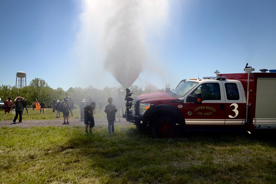 Members of Team Whiteman participate in various activities during a mock deployment, known as Operation Spirit, held at Whiteman Air Force Base, Mo., May 6, 2017. Participants had the opportunity to go through the deployment center line, pose for a photo in front of a B-2 Spirit, and advance to the obstacle course, where they also had the opportunity to get hands-on learning about several units on base. (U.S. Air Force photos by Airman 1st Class Jazmin Smith)